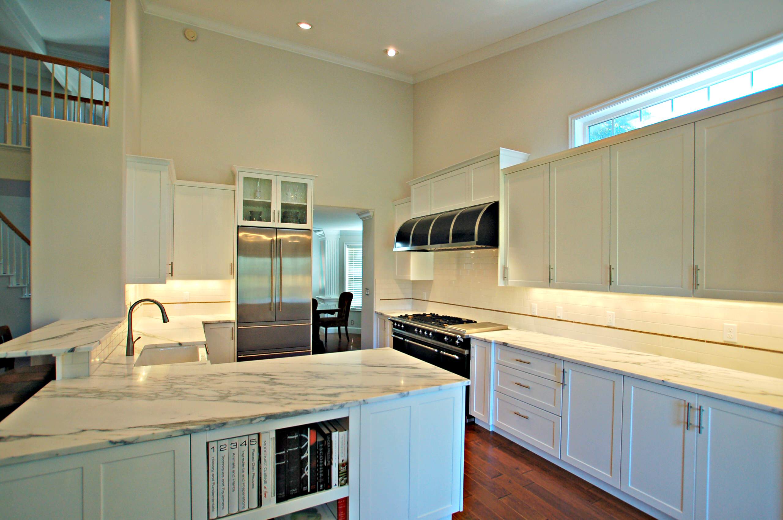 Gourmet Kitchen in Eagle with Lacanche French Range and Honed Calcutta Marble